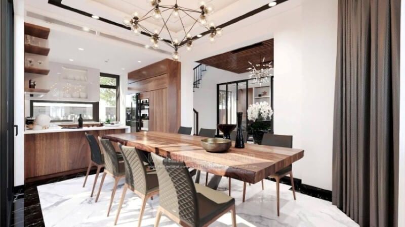 Ngoài điểm đặc biệt từ cách bố trí kệ trang trí, bàn đảo bằng đá granite màu trắng được thiết kế phô ra ngoài lại là điểm đáng chú ý, một mặt vẫn đảm bảo diện tích để chủ nhân có thể trưng bày món ăn thỏa mái, một mặt bạn lại có thể vừa nội trợ vừa có thể để mắt con học một cách dễ dàng. Tủ bếp đẹp