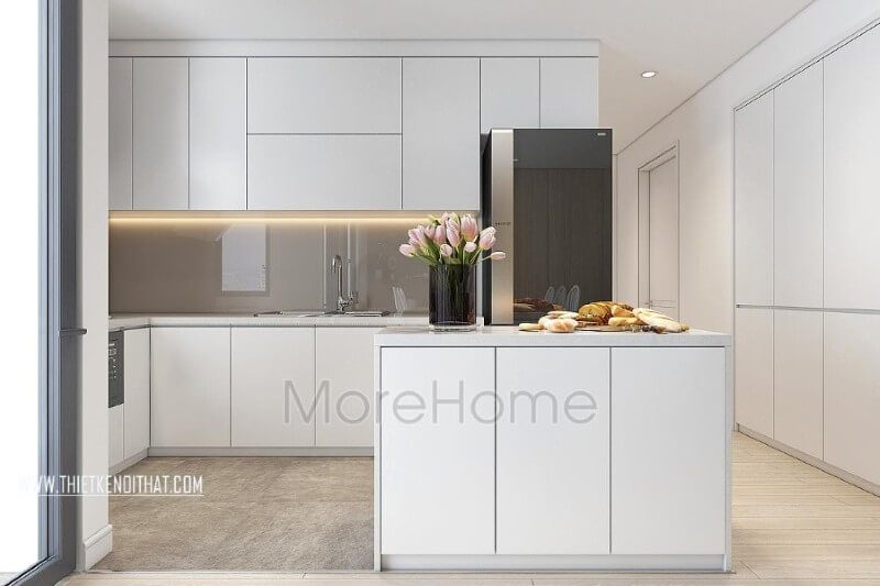 Hệ thống tủ bếp tiện nghi với tone màu trắng hiện đại gợi sự liền mạch trong mẫu thiết kế nội thất chung cư đẹp này
