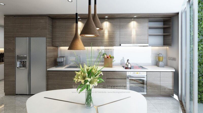 Thiết kế tủ bếp gỗ An Cường cho chung cư hiện đại. Để tạo nên không gian bếp ấn tượng, sạch sẽ và rộng rãi, gia chủ đã lựa chọn sử dụng đá ốp bên màu trắng solid surface cao cấp góp phần tạo nên một không gian bếp đẹp mắt