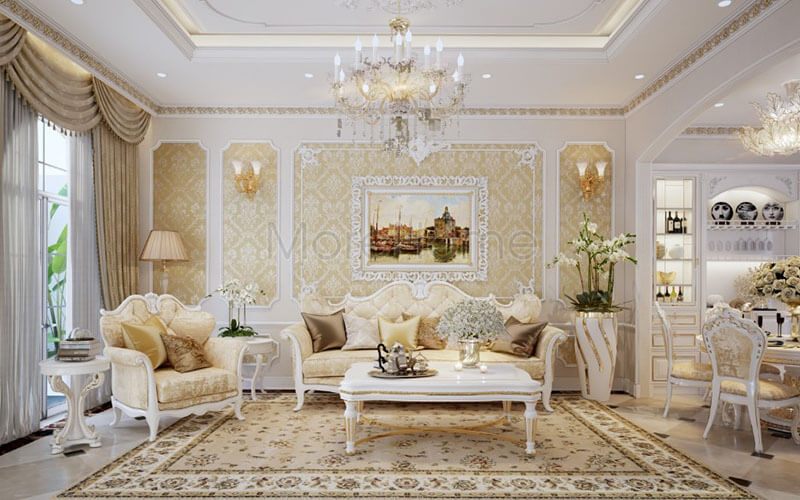 Mẫu thiết kế nội thất phòng khách đẹp và cuốn hút cho chung cư, biệt thự và căn hộ cao cấp. Với sự kết hợp chất liệu nhung mềm mại của sofa và gỗ tự nhiên tạo nên một cảm giác êm ái và ấm cúng trong ngôi nhà. Hơn thế nữa là sự kết hợp giữa tông màu chủ đạo là trắng và vàng tôn lên sự khang trang và đầy uy quyền của gia chủ.
Để tạo nên không gian đẹp hoàn hảo kia còn là sự kết hợp tuyệt mỹ của giấy dán tường cùng tông màu với chất liệu nhung của sofa.